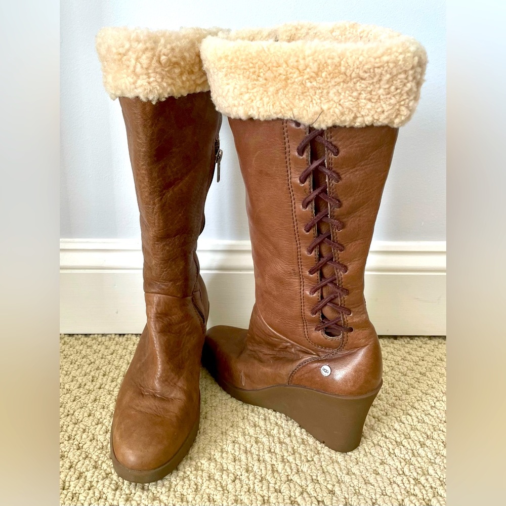 Ugg Women’s size 8 mid-calf height wedge heel leather winter boots.